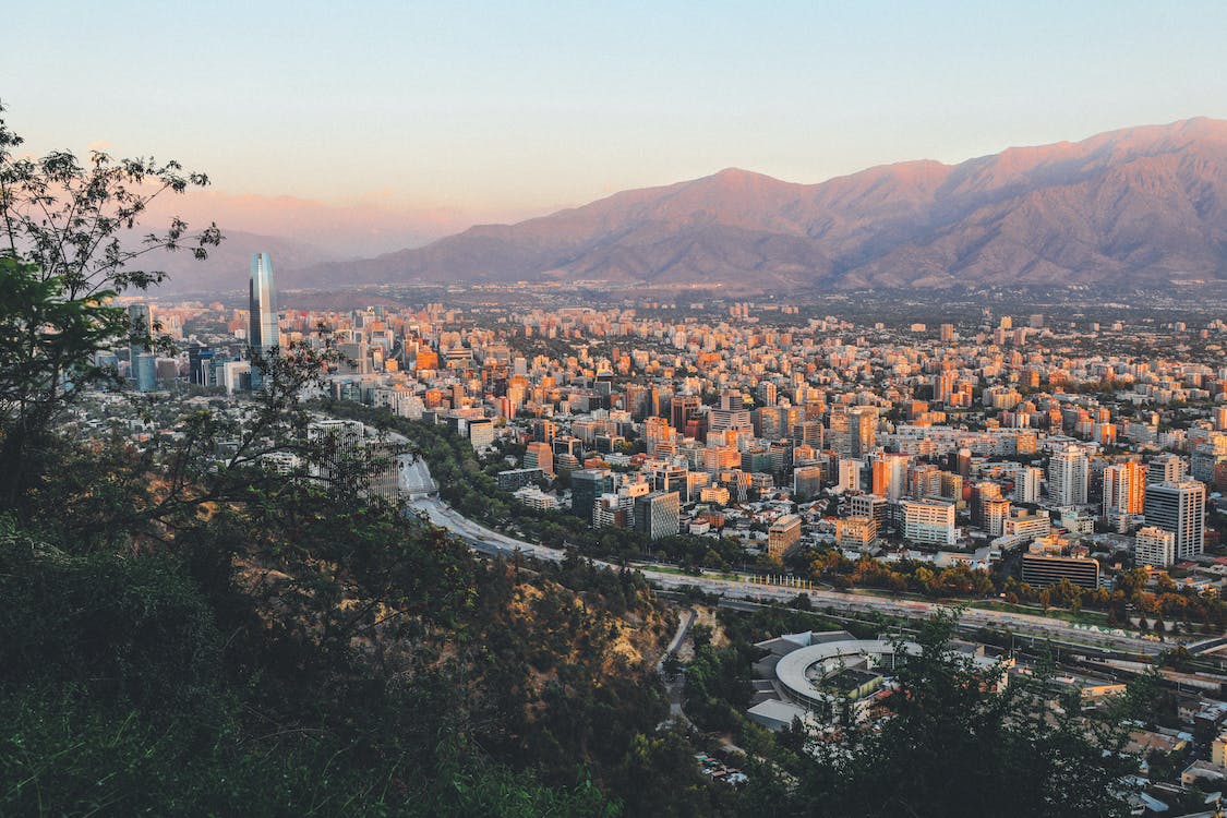 Aerial Photography of City Near Mountain. Credit: Alisha Lubben